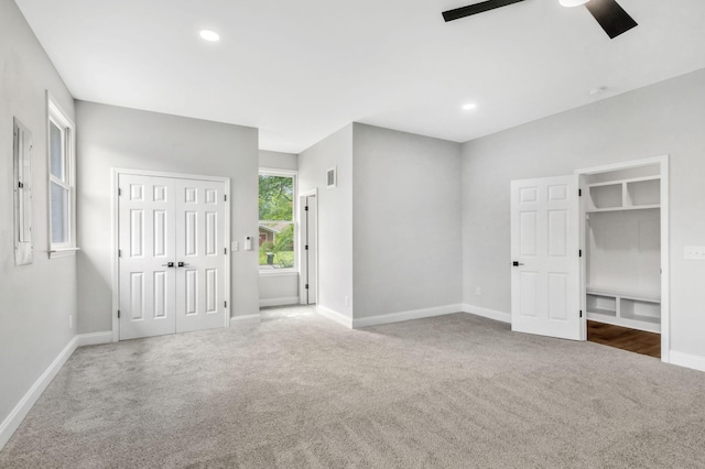 2302 Surrey Dr, Murfreesboro, TN 37129 - unfurnished bedroom with carpet, a closet, baseboards, ceiling fan, and recessed lighting