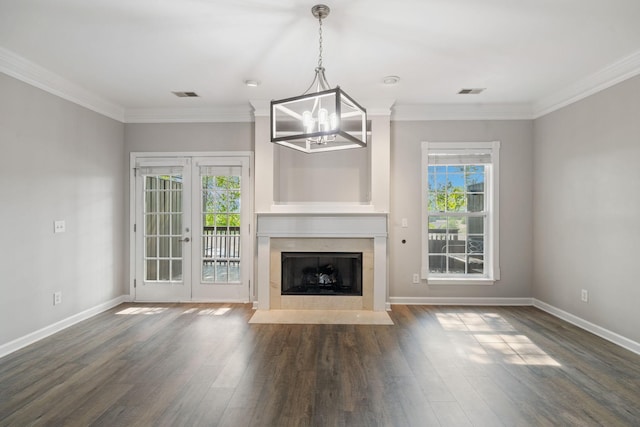 1816 Brentwood Pointe, Franklin, TN 37067 - unfurnished living room featuring plenty of natural light, dark wood-style flooring, a chandelier, baseboards, and ornamental molding