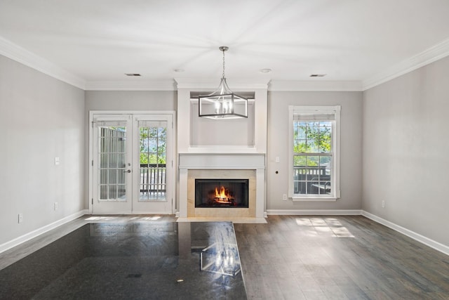 1816 Brentwood Pointe, Franklin, TN 37067 - unfurnished living room with baseboards, ornamental molding, dark wood-style floors, a fireplace with flush hearth, and a chandelier