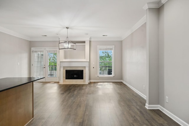 1816 Brentwood Pointe, Franklin, TN 37067 - unfurnished living room with healthy amount of natural light, dark wood-style floors, baseboards, and ornamental molding