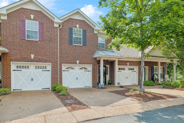 1816 Brentwood Pointe, Franklin, TN 37067 - townhome / multi-family property featuring driveway, an attached garage, brick siding, and a shingled roof