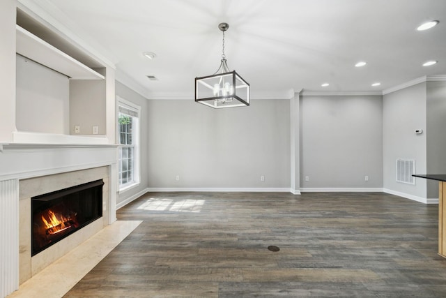 1816 Brentwood Pointe, Franklin, TN 37067 - unfurnished living room with crown molding, a premium fireplace, baseboards, recessed lighting, and a chandelier