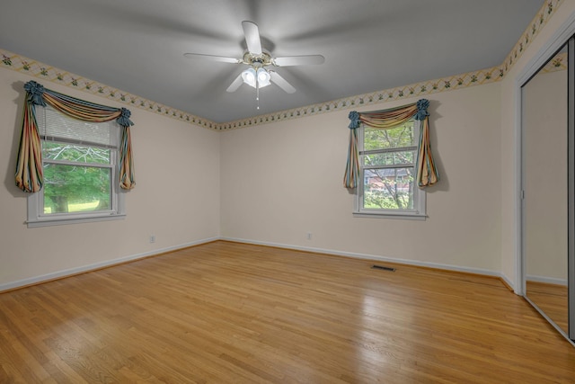 311 Broadview Dr, Dickson, TN 37055 - spare room featuring light wood-style floors, baseboards, plenty of natural light, and ceiling fan