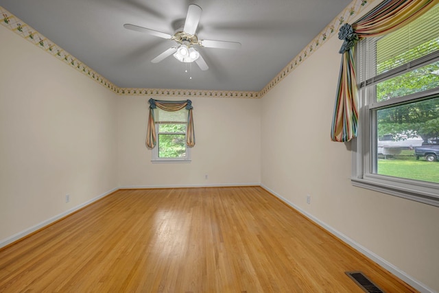 311 Broadview Dr, Dickson, TN 37055 - spare room with light wood finished floors, baseboards, and a ceiling fan