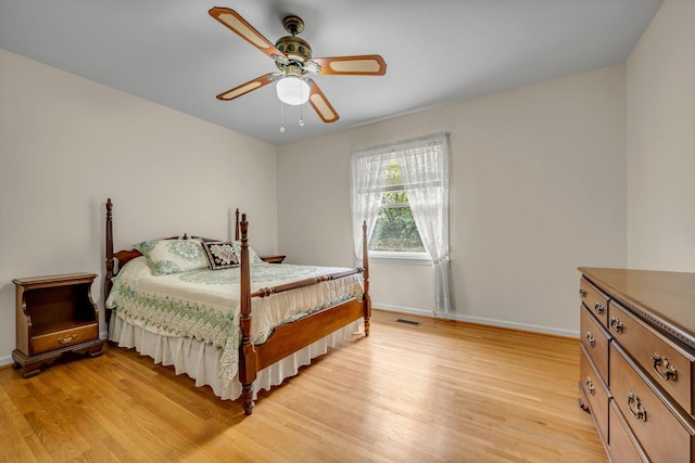 311 Broadview Dr, Dickson, TN 37055 - bedroom with light wood finished floors, baseboards, and ceiling fan