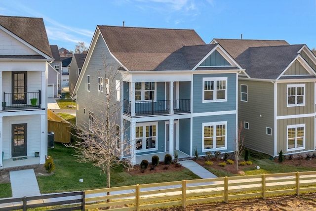 1012 Indigo Aly, Brentwood, TN 37027 - view of front of home with a balcony, covered porch, board and batten siding, roof with shingles, and cooling unit