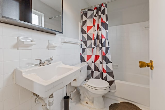 276 White Bridge Pike Unit 70, Nashville, TN 37209 - bathroom featuring tile walls, toilet, shower / bathtub combination with curtain, and a sink