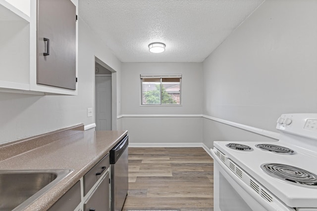 276 White Bridge Pike Unit 70, Nashville, TN 37209 - kitchen featuring white range with electric cooktop, stainless steel dishwasher, a textured ceiling, wood finished floors, and a sink