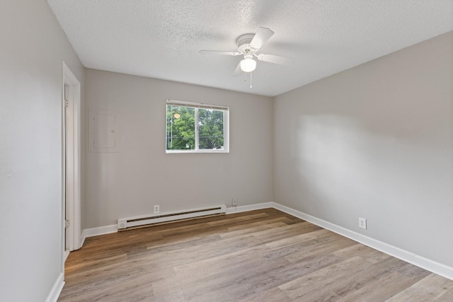 276 White Bridge Pike Unit 70, Nashville, TN 37209 - unfurnished room with a baseboard heating unit, ceiling fan, a textured ceiling, light wood-style flooring, and baseboards