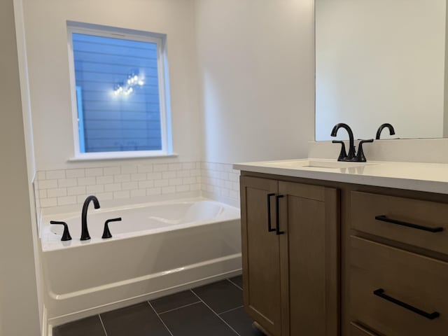 1279 Linn Cove Ct, Gallatin, TN 37066 - bathroom featuring vanity, tile patterned flooring, and a bath