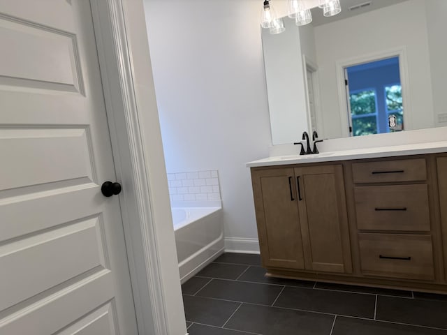 1279 Linn Cove Ct, Gallatin, TN 37066 - full bath with vanity, tile patterned floors, a garden tub, and baseboards