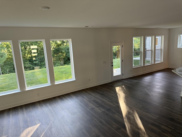 1279 Linn Cove Ct, Gallatin, TN 37066 - unfurnished living room featuring baseboards and dark wood-type flooring