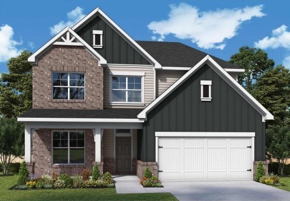 1102 Callaway Dr, Lebanon, TN 37087 - craftsman-style house featuring board and batten siding, brick siding, driveway, and a garage