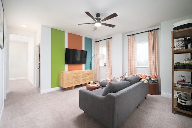 1102 Callaway Dr, Lebanon, TN 37087 - living room with light colored carpet, a ceiling fan, and baseboards