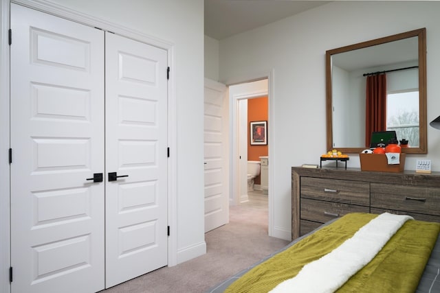 1102 Callaway Dr, Lebanon, TN 37087 - bedroom with light carpet, a closet, and baseboards