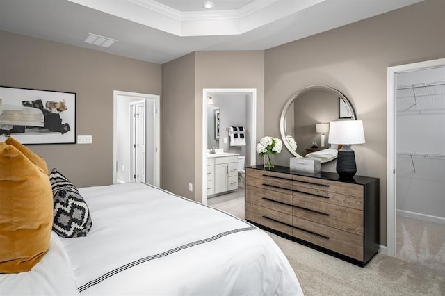 4038 Gaskill Dr Unit 113B, Smyrna, TN 37167 - bedroom with a walk in closet, ornamental molding, a closet, a raised ceiling, and light carpet