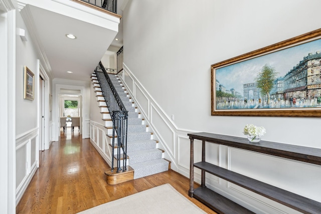327 Whitworth Way, Nashville, TN 37205 - stairs featuring a decorative wall, wood finished floors, ornamental molding, a wainscoted wall, and recessed lighting