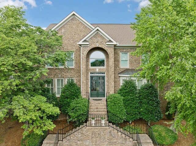 327 Whitworth Way, Nashville, TN 37205 - view of front of home featuring french doors, brick siding, and roof with shingles