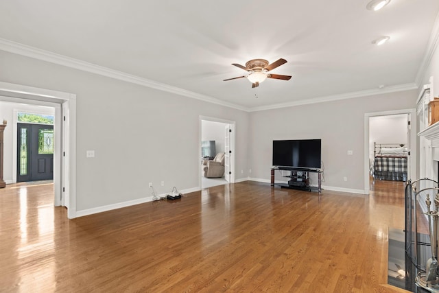 1010 Saint Blaise Trl, Gallatin, TN 37066 - unfurnished living room with a ceiling fan, wood finished floors, ornamental molding, and baseboards