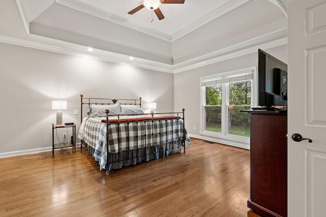 1010 Saint Blaise Trl, Gallatin, TN 37066 - bedroom featuring a raised ceiling, wood finished floors, ornamental molding, baseboards, and recessed lighting