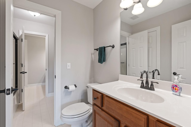 1010 Saint Blaise Trl, Gallatin, TN 37066 - bathroom featuring vanity, toilet, tile patterned flooring, and baseboards