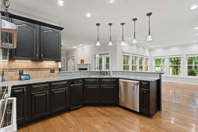 1010 Saint Blaise Trl, Gallatin, TN 37066 - kitchen with dishwasher, a sink, light wood finished floors, crown molding, and recessed lighting
