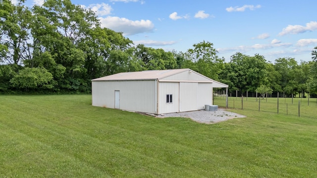 1010 Saint Blaise Trl, Gallatin, TN 37066 - view of pole building featuring a lawn and view of scattered trees