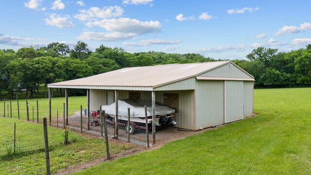 1010 Saint Blaise Trl, Gallatin, TN 37066 - view of pole building featuring a carport and driveway