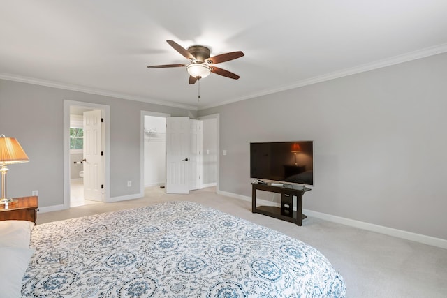 1010 Saint Blaise Trl, Gallatin, TN 37066 - bedroom with crown molding, light carpet, a walk in closet, baseboards, and ensuite bath