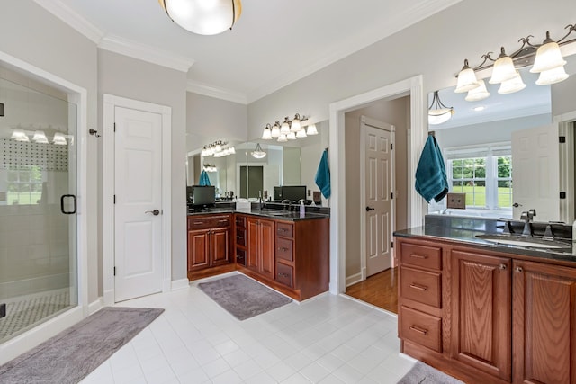 1010 Saint Blaise Trl, Gallatin, TN 37066 - full bathroom with crown molding, a stall shower, two vanities, and tile patterned flooring