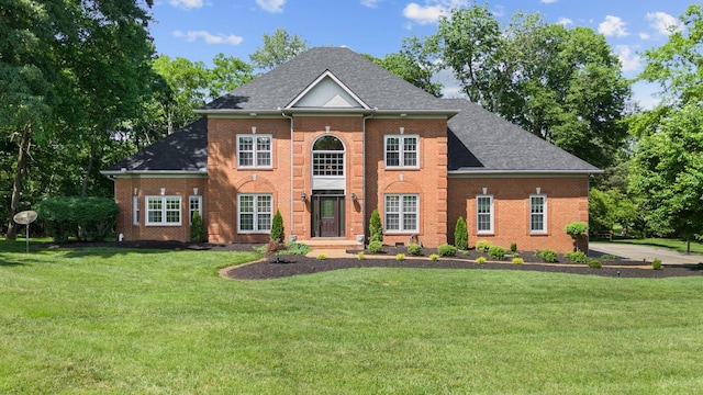 1010 Saint Blaise Trl, Gallatin, TN 37066 - colonial-style house with a front lawn, brick siding, and a shingled roof