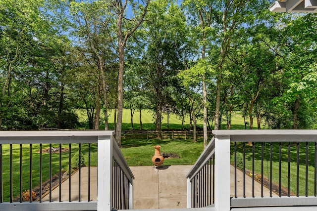 1010 Saint Blaise Trl, Gallatin, TN 37066 - deck featuring a yard and view of wooded area