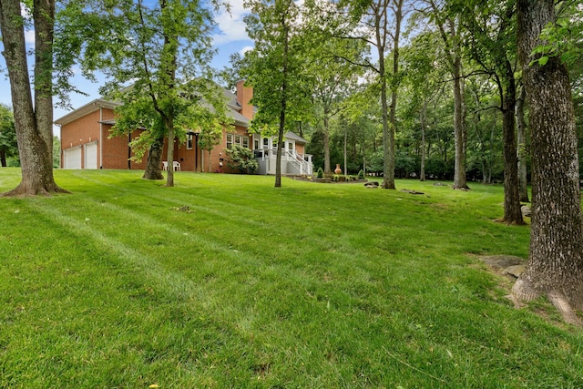 1010 Saint Blaise Trl, Gallatin, TN 37066 - view of green lawn featuring an attached garage