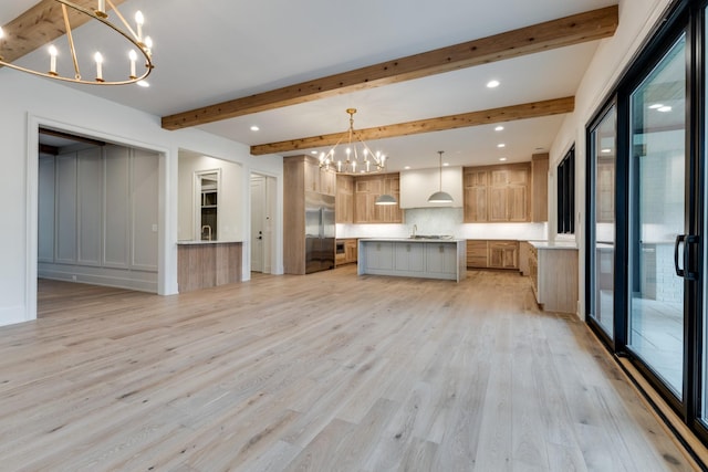 2756 Otterham Dr, Thompsons Station, TN 37179 - kitchen with a chandelier, plenty of natural light, light wood finished floors, beamed ceiling, and recessed lighting