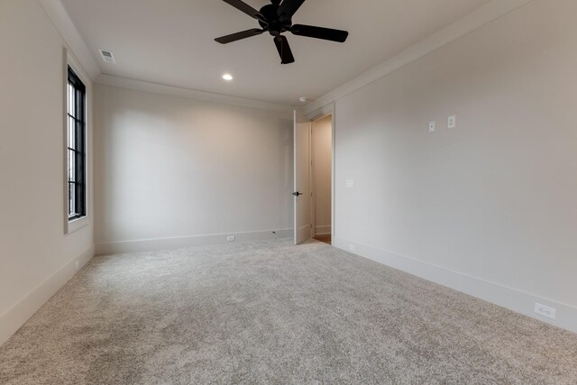 2756 Otterham Dr, Thompsons Station, TN 37179 - spare room featuring carpet, a ceiling fan, recessed lighting, crown molding, and baseboards