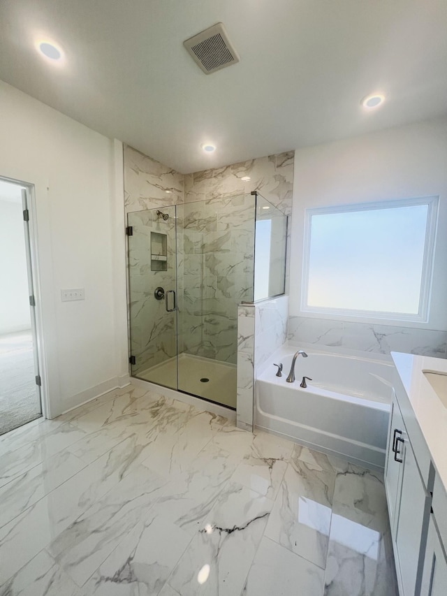 310 Carver Ln, Lebanon, TN 37087 - bathroom featuring a marble finish shower, a garden tub, vanity, recessed lighting, and marble finish floors