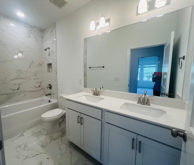 310 Carver Ln, Lebanon, TN 37087 - bathroom with double vanity, tub / shower combination, and marble look tiles