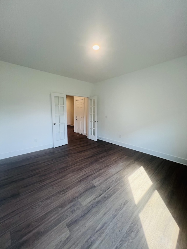 310 Carver Ln, Lebanon, TN 37087 - unfurnished room with baseboards and dark wood-style flooring