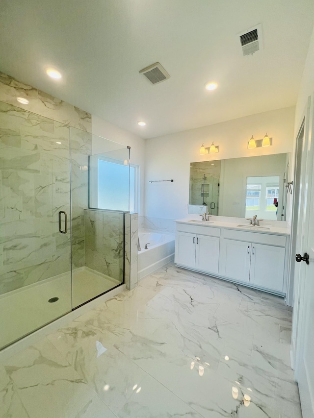 310 Carver Ln, Lebanon, TN 37087 - bathroom with a garden tub, a marble finish shower, double vanity, recessed lighting, and marble finish floors