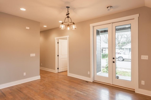 1600 Anderson Ave, Chattanooga, TN 37404 - doorway featuring french doors, healthy amount of natural light, wood finished floors, and recessed lighting