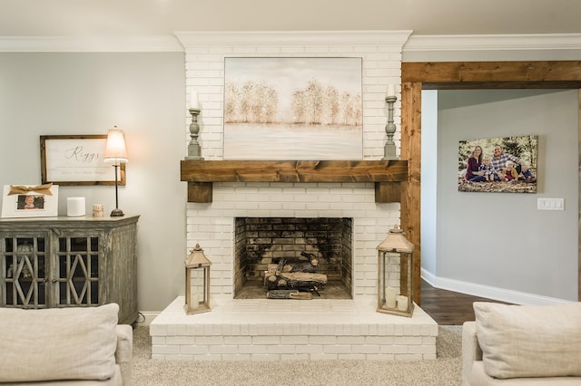 1078 Sunset Dr, Gallatin, TN 37066 - living area featuring ornamental molding, baseboards, a fireplace, and wood finished floors