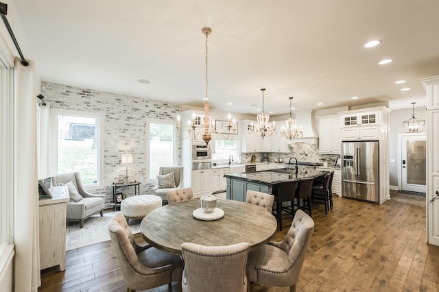 1078 Sunset Dr, Gallatin, TN 37066 - dining space featuring dark wood-style flooring, a chandelier, and recessed lighting