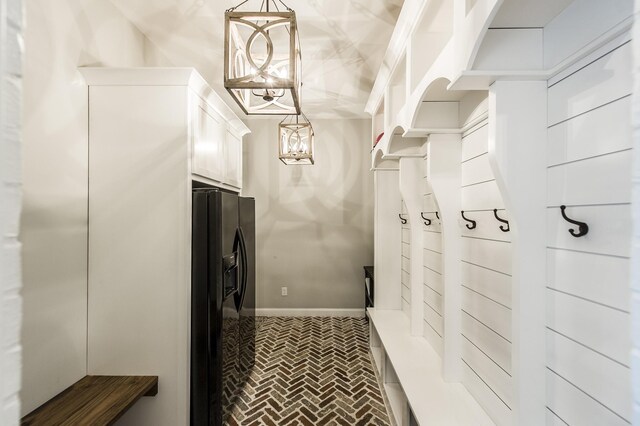 1078 Sunset Dr, Gallatin, TN 37066 - mudroom featuring brick patterned flooring and baseboards