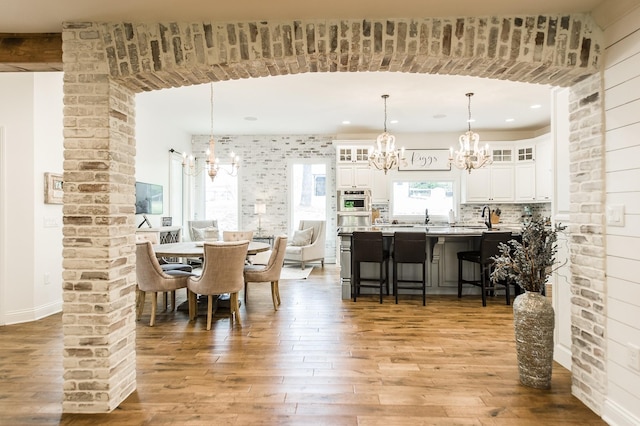 1078 Sunset Dr, Gallatin, TN 37066 - dining area with a chandelier, light wood-style floors, and recessed lighting
