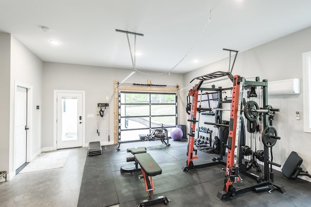 1078 Sunset Dr, Gallatin, TN 37066 - workout area featuring recessed lighting, a wall mounted air conditioner, and baseboards