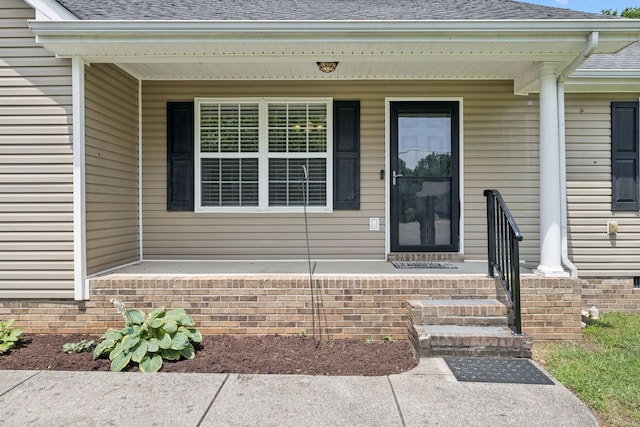 1006 Aretha Dr, Murfreesboro, TN 37128 - entrance to property with roof with shingles and covered porch