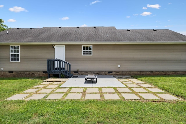 1006 Aretha Dr, Murfreesboro, TN 37128 - back of property featuring crawl space, a patio area, a lawn, and roof with shingles