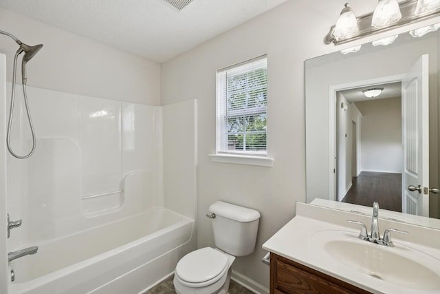 1006 Aretha Dr, Murfreesboro, TN 37128 - full bathroom featuring vanity, toilet, shower / tub combination, baseboards, and a textured ceiling