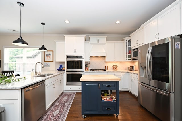 146 Monarchos Dr, Gallatin, TN 37066 - kitchen featuring appliances with stainless steel finishes, a sink, butcher block counters, white cabinets, and a peninsula