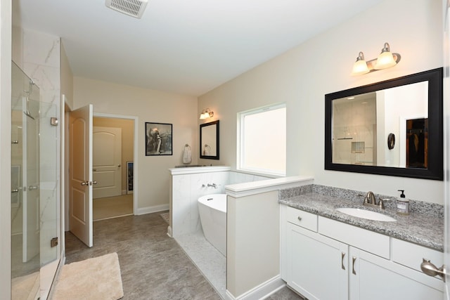 146 Monarchos Dr, Gallatin, TN 37066 - bathroom featuring a shower stall, a soaking tub, and vanity